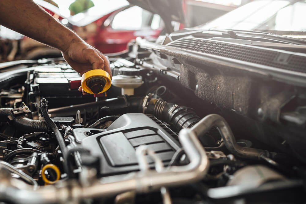 Maximizing Engine Performance – The Benefits of Timely Oil Changes 1 MAGIC TOUCH AUTO GARAGE BEST CAR GARAGE IN ABU DHAB Top rated car oil change in Abu Dhabi